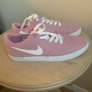New, never worn pink Nike Women’s Sneakers, size 8.5.